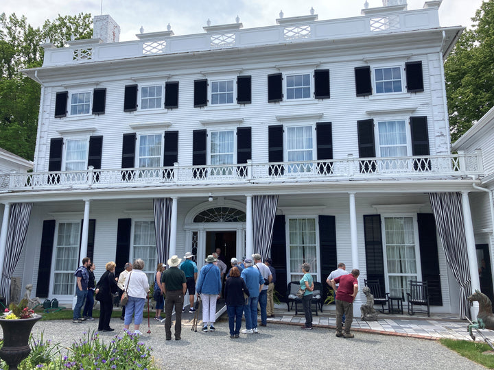 Man wearing swim cap and smart swim goggles